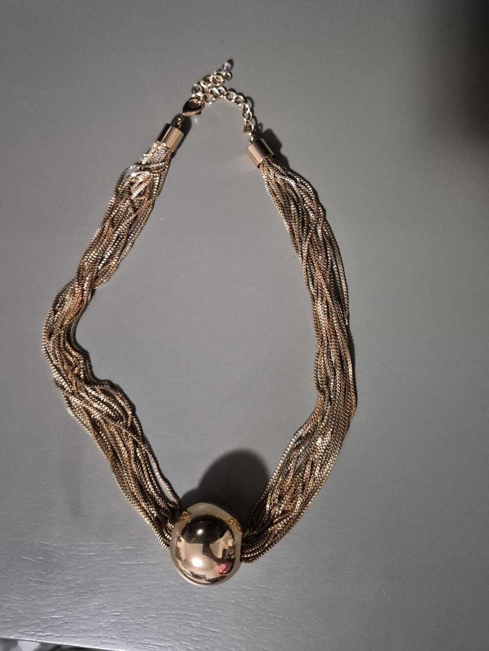 Gold Multi-Strand Statement Necklace with Polished Orb Pendant